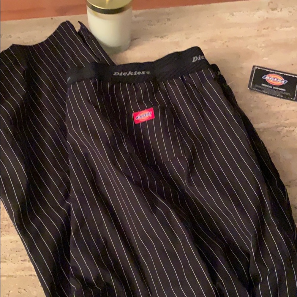Black pants with white stripes brand new with tags